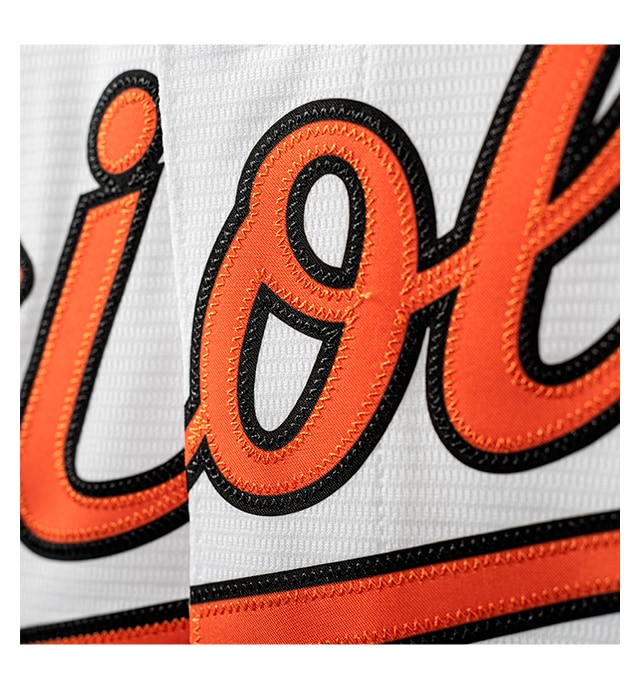 Premium twill team logo and numbers on back for an on-field look.