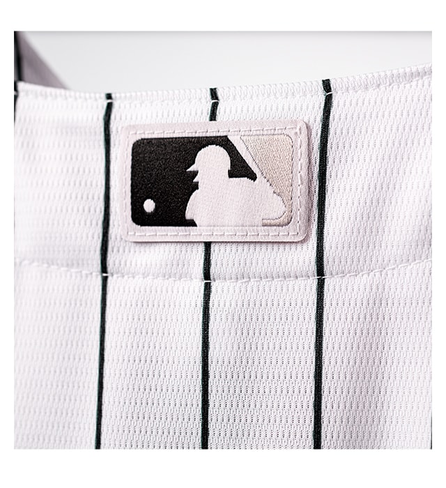 Woven MLB logo sewn-on center back neck for authenticity.